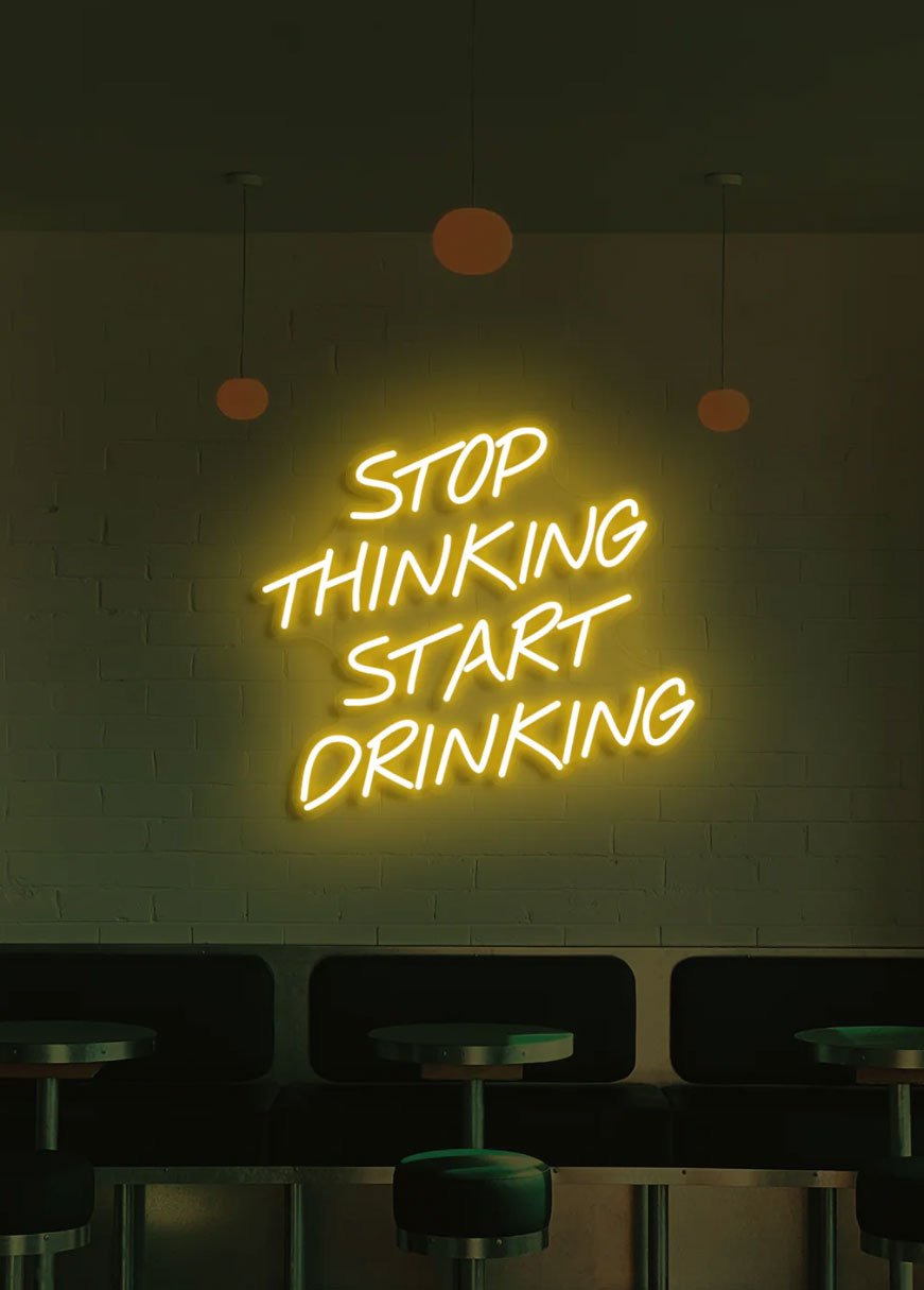 stop-thinking-start-drinking-neon-sign-golden-yellow