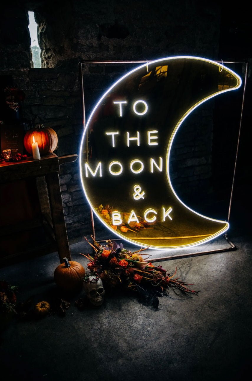 to-the-moon-and-back-neon-sign